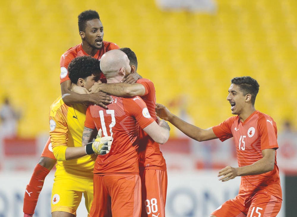 Al Arabi SC players celebrate their win over Al Khor in the Amir Cup Round of 16 match at Al Gharafa Stadium yesterday.