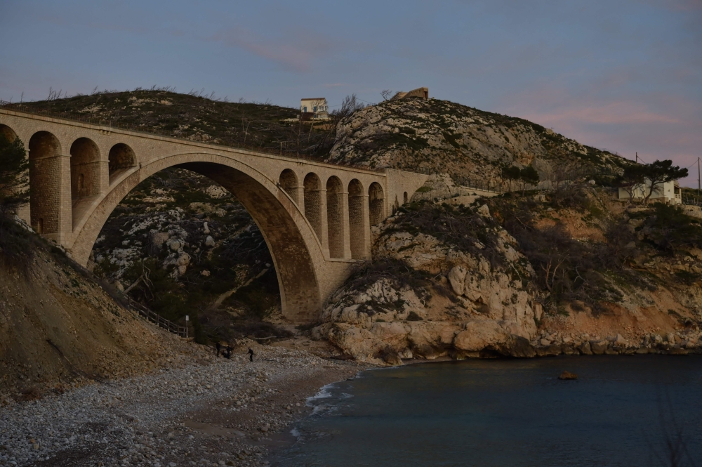 A picture taken on February 6, 2020 shows a view of the coast during the sunset at The Vacanciel Holiday Resort in Carry-le-Rouet, near Marseille, southern France, where French citizens are in quarantine following their repatriation from the coronavirus z