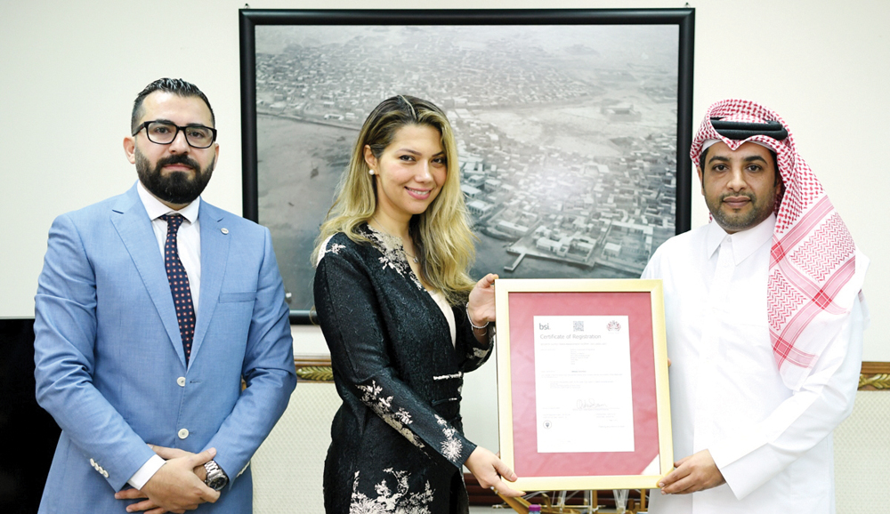 Director General of Industrial Security, Lt. Col. Khalifa Mohammad Al Attiyah, receiving ISO 28000 certificate from First Secretary of the British Embassy in Doha and Director of Trade & Investment, Department for International Trade, Jinoos Shariati.