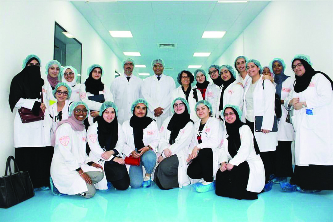 Qatar University’s College of Pharmacy students pose for a group photo during their visit to Qatar Pharma.