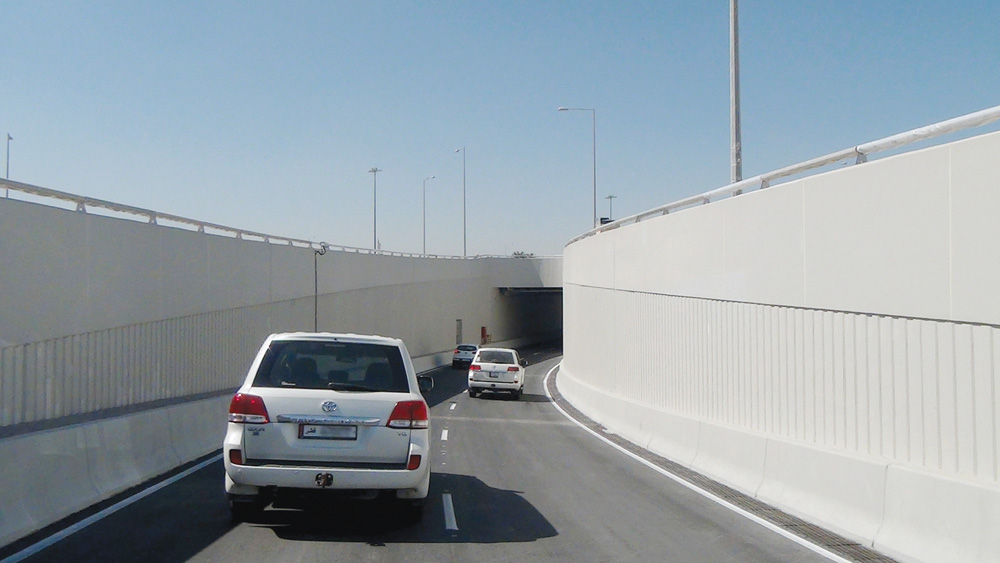 Vehicles passing through the new underpass at Mesaimeer Interchange.