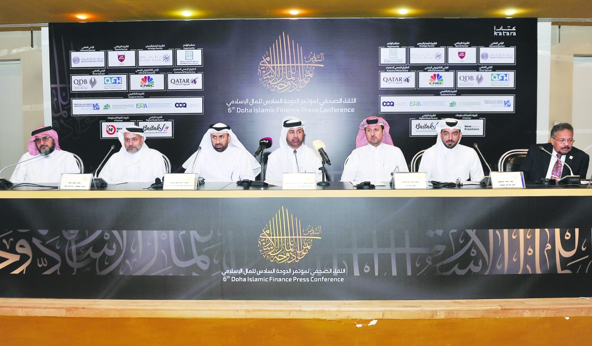 FROM LEFT: QFC Chief Executive Officer, Yousuf Al Jaida, Dr. Osama Qais Al Derai’ei, Managing Director and CEO of Bait Al Mashura Finance Consultations; Dr. Khalid bin Ibrahim Al Sulaiti, Deputy Chairman of Bait Al Mashura addressing the media, yesterday.
