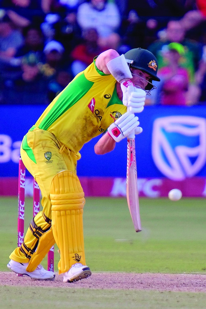 David Warner of Australia plays bats during the second T20 international cricket match between South Africa and Australia at the St George's Park Cricket Ground in Port Elizabeth on February 23, 2020. AFP / Michael Sheehan
