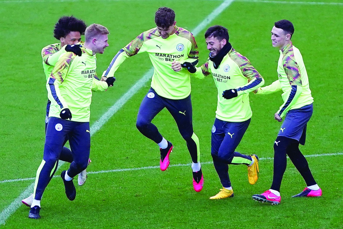 Manchester City's German midfielder Leroy Sane (L), Manchester City's Belgian midfielder Kevin De Bruyne (2L), Manchester City's English defender John Stones (C) Manchester City's Spanish midfielder David Silva (2R) and Manchester City's English midfielde