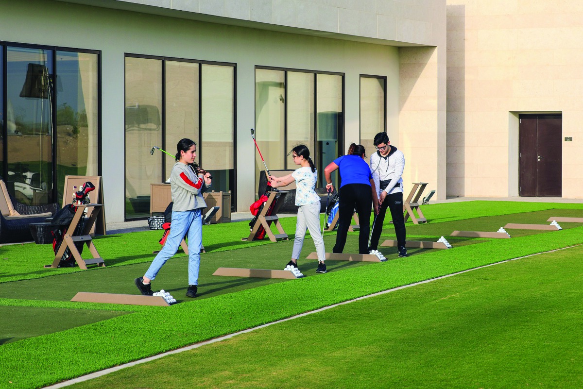A practising session at Qatar Foundation’s Education City Golf Club . 