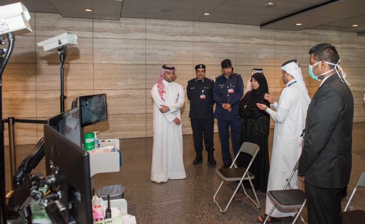 The Minister of Public Health, H E Dr. Hanan Mohammed Al Kuwari, is briefed on the measures to curb the menace of coronavirus at the Hamad International Airport.  
