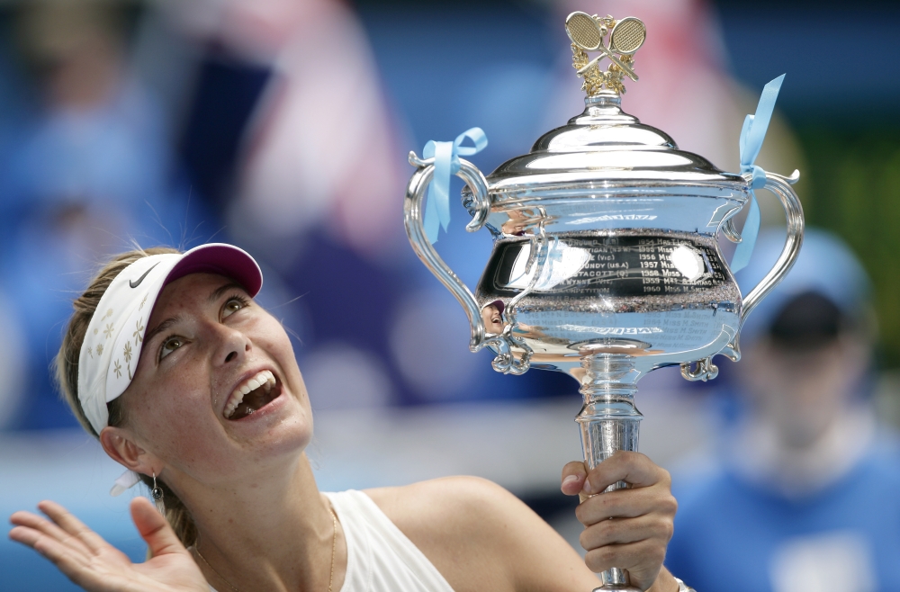 FILE PHOTO: Tennis - Australian Open - Melbourne Park - Australia - January 26, 2008 Russia's Maria Sharapova celebrates winning the Australian Open with trophy Action Images via Reuters/Brandon Malone