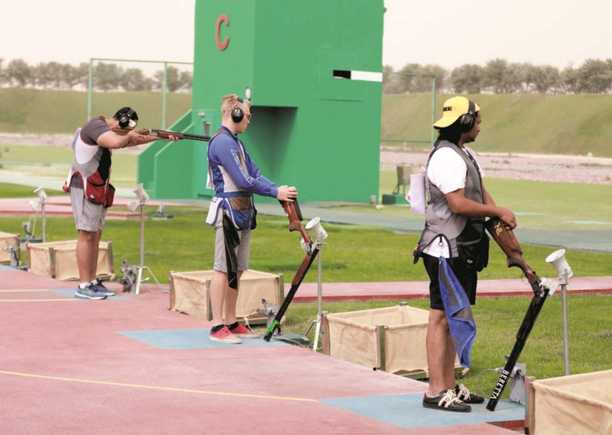 Qatar’s Olympic-bound Mohammed Al Rumaihi (left) in action during the Men’s Trap event of the Qatar Open Shotgun Championship at the Losail Shooting Range, yesterday. Pictures: Syed Omar