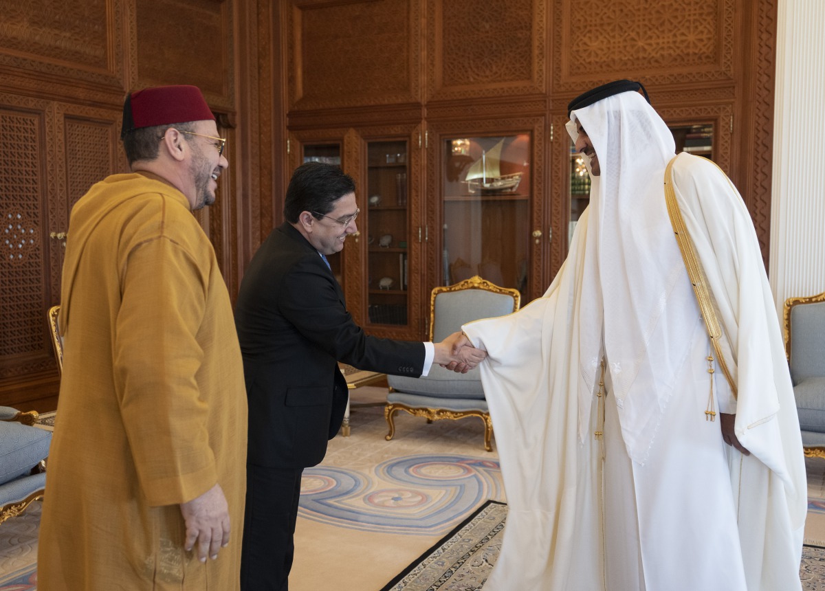 Amir H H Sheikh Tamim bin Hamad Al Thani with the Adviser to H M King of Morocco, H E Fouad Ali El Himma, and the Morocco’s Minister of Foreign Affairs and International Cooperation, H E Nasser Bourita, at the Amiri Diwan, yesterday.