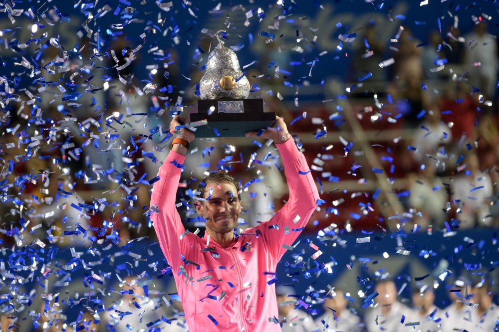 Spain's Rafael Nadal Rafael Nadal holds the trophy after winning the Mexican Tennis Open ATP final match against USA's Taylor Fritz during the Mexico ATP Open men's singles tennis final in Acapulco, Guerrero state on February 29, 2020. AFP / PEDRO PARDO