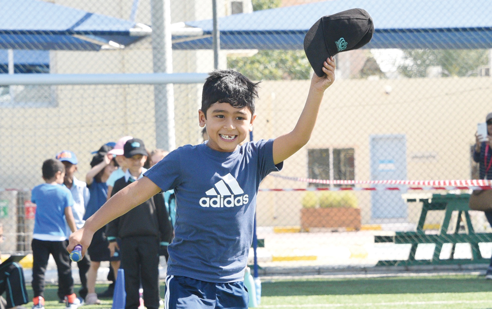 A child taking part in a sport competition during Compass International School sports week.