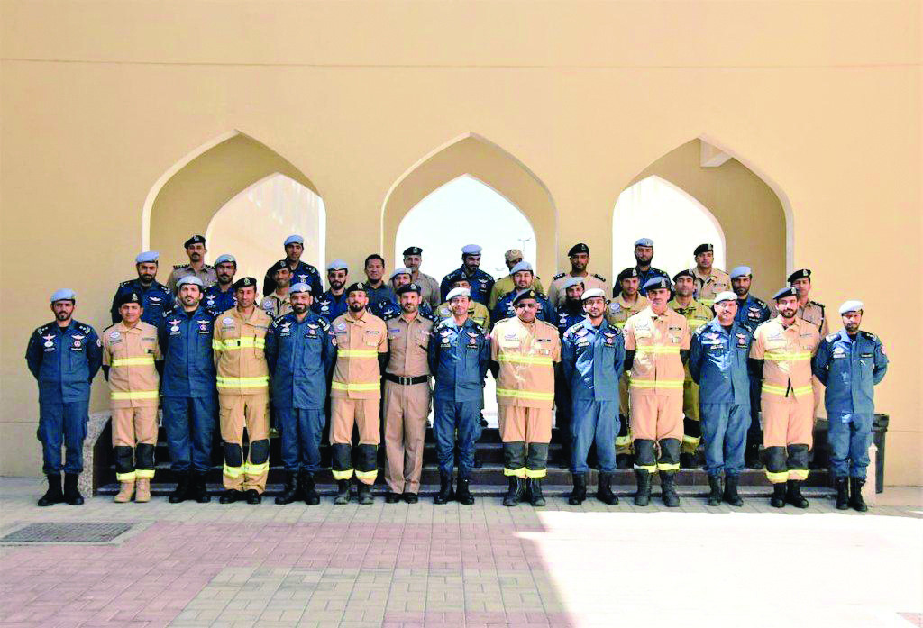 The members of Lekhwiya’s Search and Rescue Team and Sultanate of Oman’s Public Authority for Civil Defence and Ambulance, pose for a photograph.