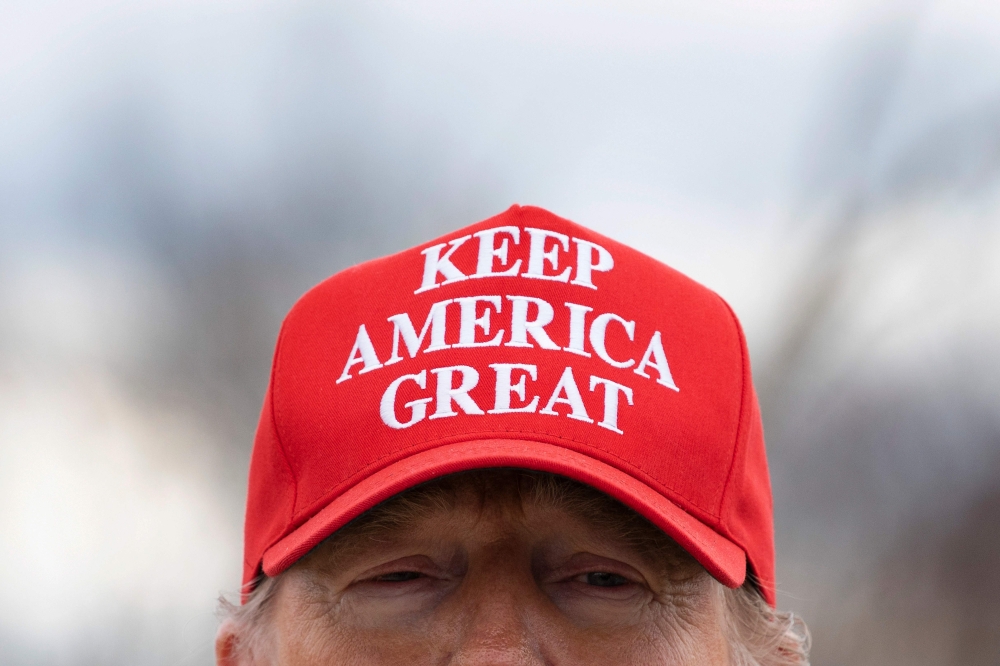 This March 6, 2020 photo shows US President Donald Trump speaks after touring tornado damage in Cookeville, Tennessee. AFP / Jim Watson 