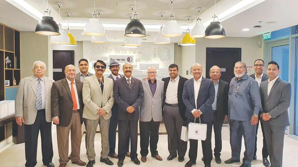 Prominent business owners of SMEs pose for a group photo at Premier Inn Doha Airport Hotel.
