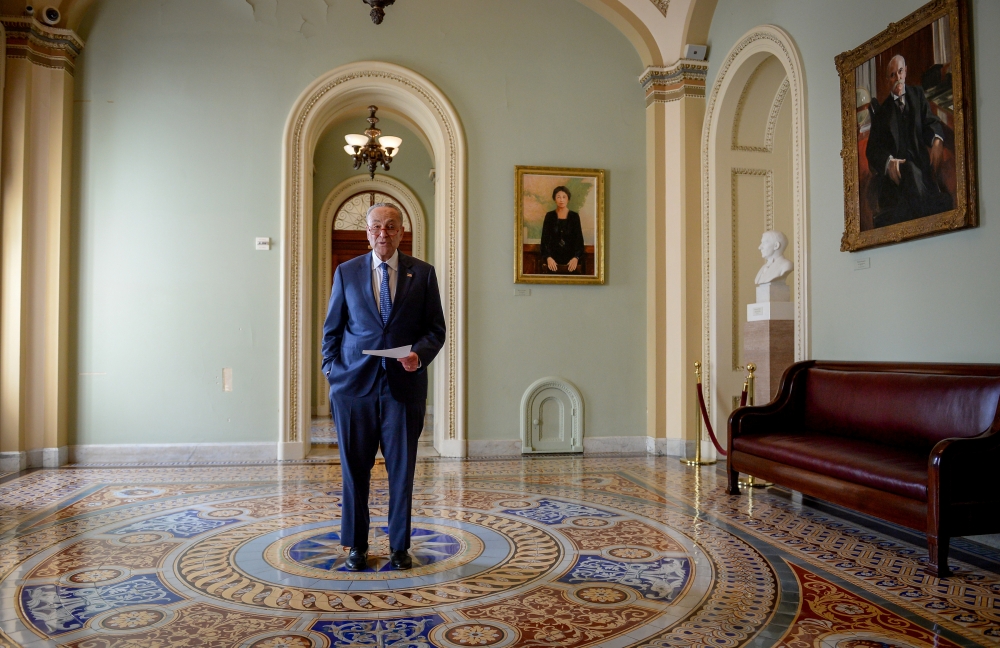 U.S. Senate Minority Leader Chuck Schumer (D-NY) makes a statement after meetings to wrap up work on coronavirus economic aid legislation, during the coronavirus disease (COVID-19) outbreak, in Washington, U.S., March 22, 2020. REUTERS/Mary F. Calvert