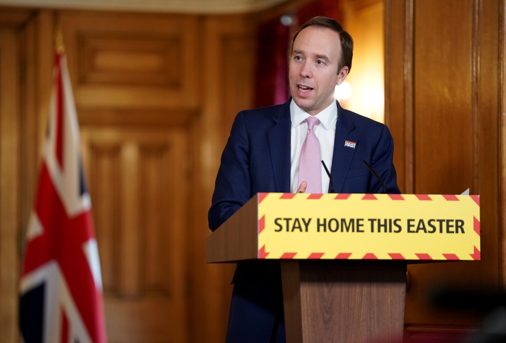 A handout image released by 10 Downing Street, shows Britain's Health Secretary Matt Hancock speaking during a remote press conference to update the nation on the Covid-19 pandemic, inside 10 Downing Street in central London on April 10, 2020. AFP PHOTO /