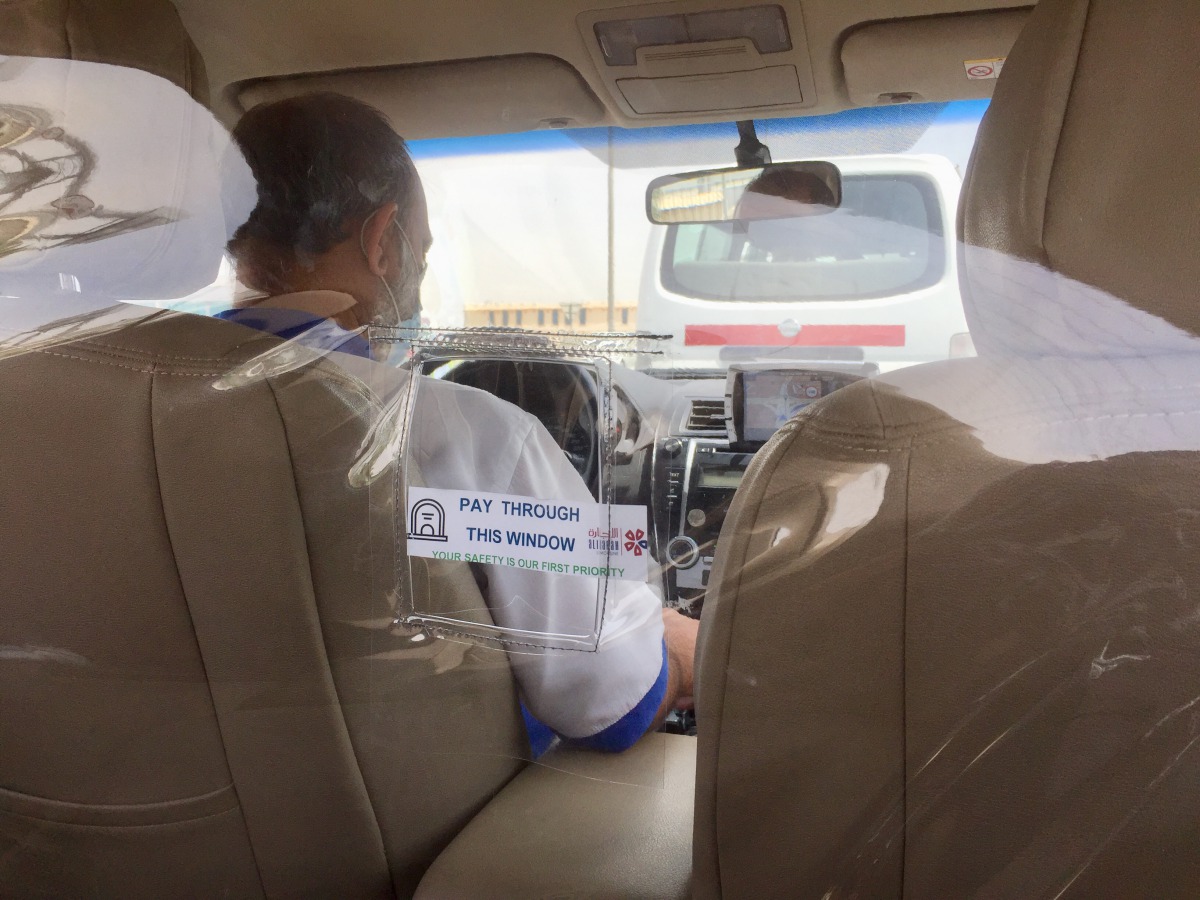 A protective plastic shield is installed in one of the Karwa taxis. Pic: Raynald C Rivera/The Peninsula
