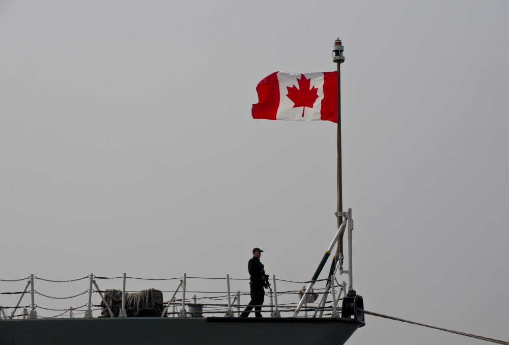 (FILES) This file photograph taken on March 13, 2015, shows a Canadian soldier as he stands on board frigate HMCS Fredericton docked at Constanta Harbour in Constanta, Romania. AFP / Daniel Mihailescu  