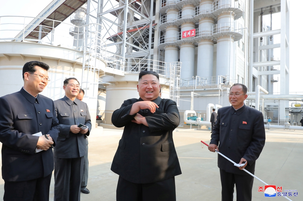 North Korean leader Kim Jong Un attends the completion of a fertiliser plant, in a region north of the capital, Pyongyang, in this image released by North Korea's Korean Central News Agency (KCNA) on May 2, 2020. KCNA/via REUTERS