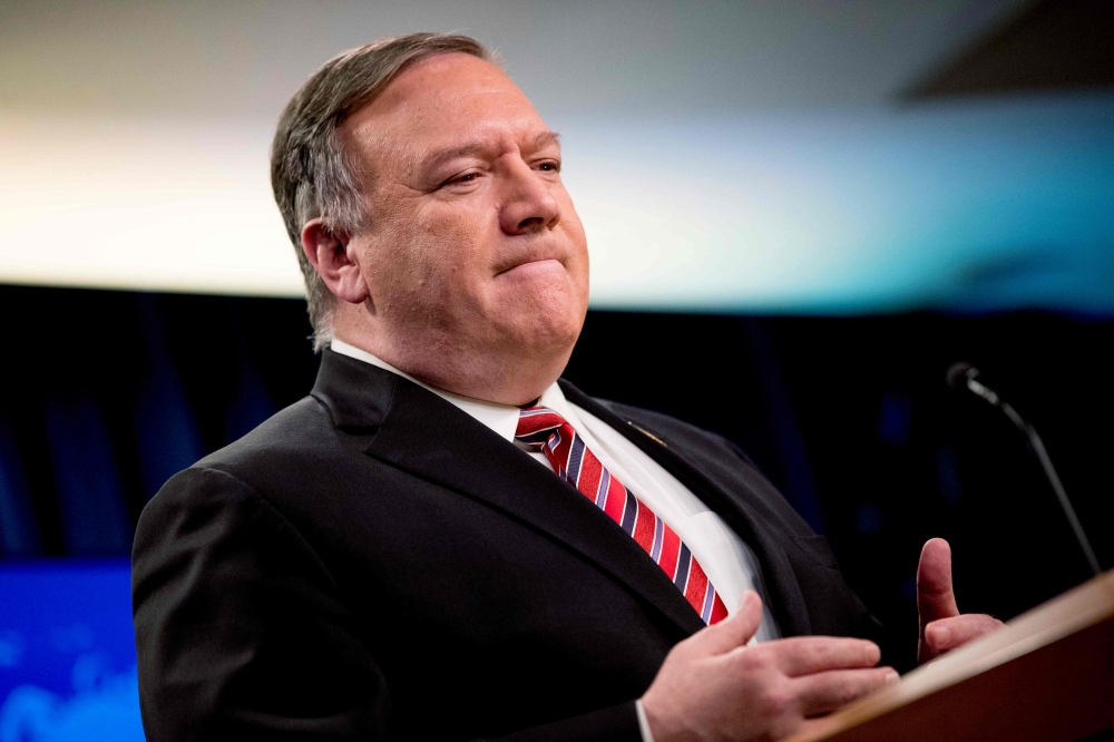 (FILES) In this file photo US Secretary of State Mike Pompeo pauses while speaking at a news conference at the State Department on April 29, 2020, in Washington, DC. AFP / POOL / Andrew Harnik