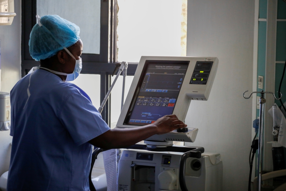 A nurse demonstrates how to activate a respirator as the hospital prepares for the coronavirus disease (COVID-19) outbreak, at the Karen hospital near Nairobi, Kenya, April 6, 2020. Picture taken April 6, 2020. REUTERS/Baz Ratner
