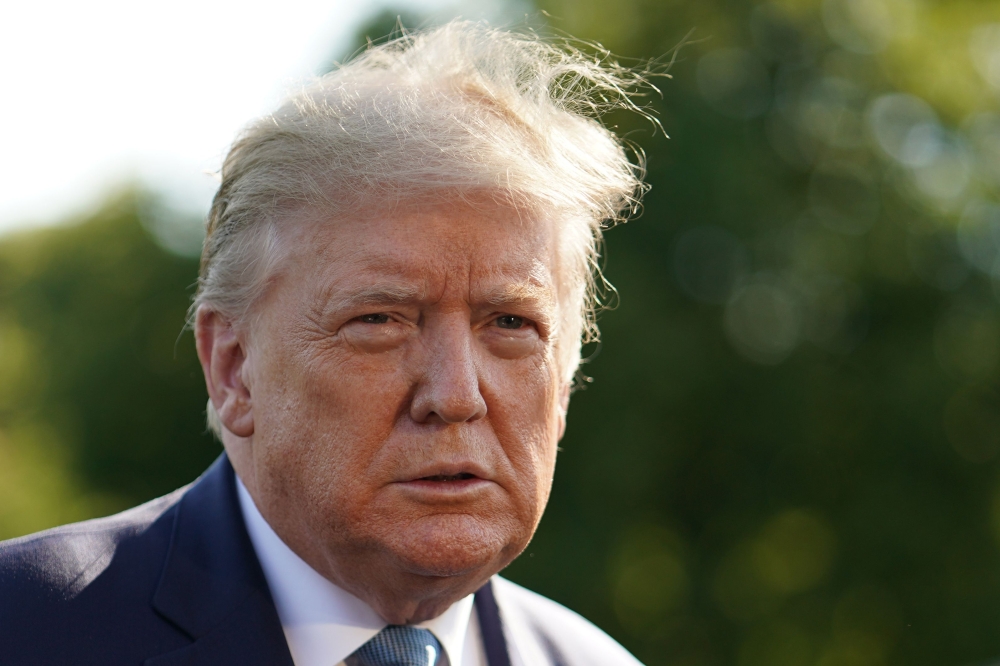 US President Donald Trump arrives to speak to the press before departing from the South Lawn of the White House in Washington, DC on May 15, 2020. Trump is heading to Camp David presidential retreat in Maryland. / AFP / MANDEL NGAN
