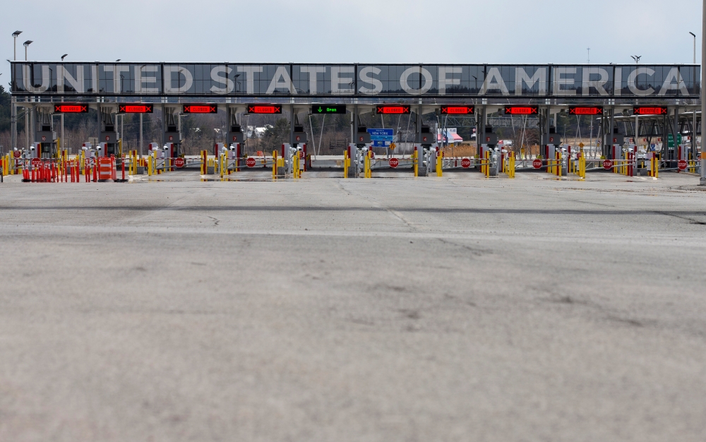 FILE PHOTO: The U.S.-Canada border crossing is seen amid the coronavirus disease (COVID-19) outbreak in Lacolle, Quebec, Canada April 17, 2020. REUTERS/Christinne Muschi/File Photo
