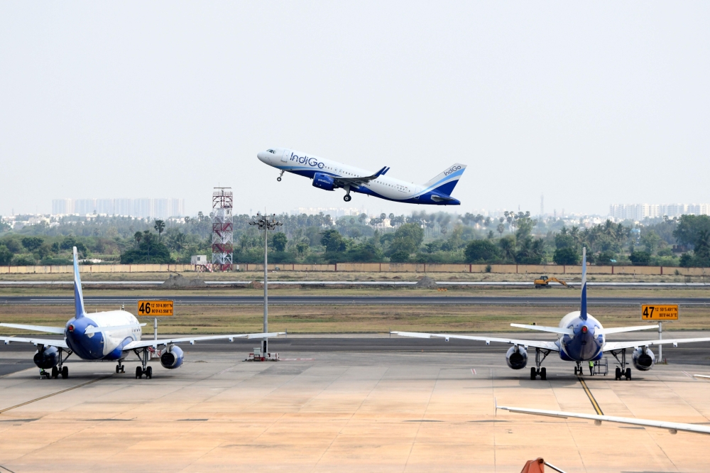 An Indigo flight directed to Varanasi takes off at the Kamaraj domestic airport during the first day of resuming of domestic flights after the government imposed a nationwide lockdown as a preventive measure against the spread of the COVID-19 coronavirus,