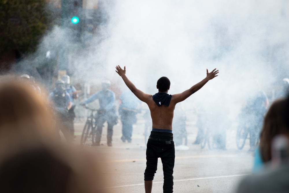 Police fire tear gas at protestors on Wednesday, May 27, 2020, during the second day of protests over the death of George Floyd in Minneapolis.  Steel Brooks - Anadolu 