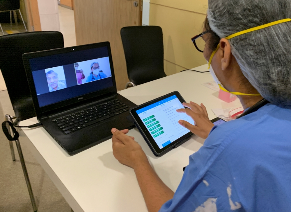 Doctor Sushila Kataria gives consultation to a patient via video call, amid the spread of the coronavirus disease (COVID-19), at Medanta Hospital in Gurugram, India, May 22, 2020. Picture taken May 22, 2020. REUTERS/Sunil Kataria