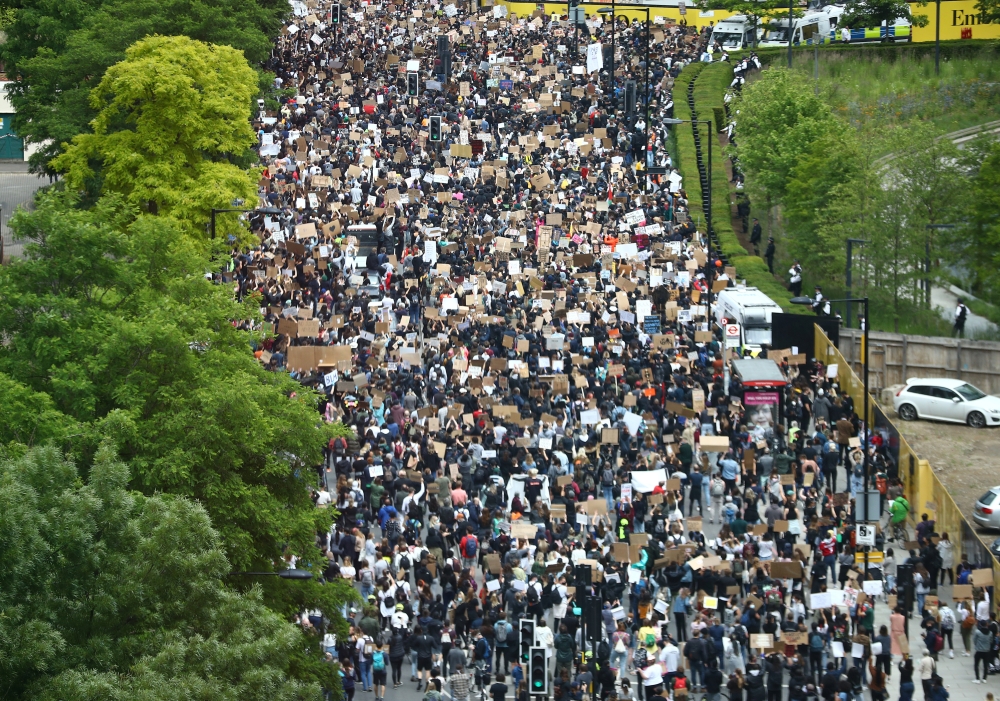 Demonstrators march during a Black Lives Matter protest in London, following the death of George Floyd who died in police custody in Minneapolis, London, Britain, June 7, 2020. REUTERS/Hannah McKay