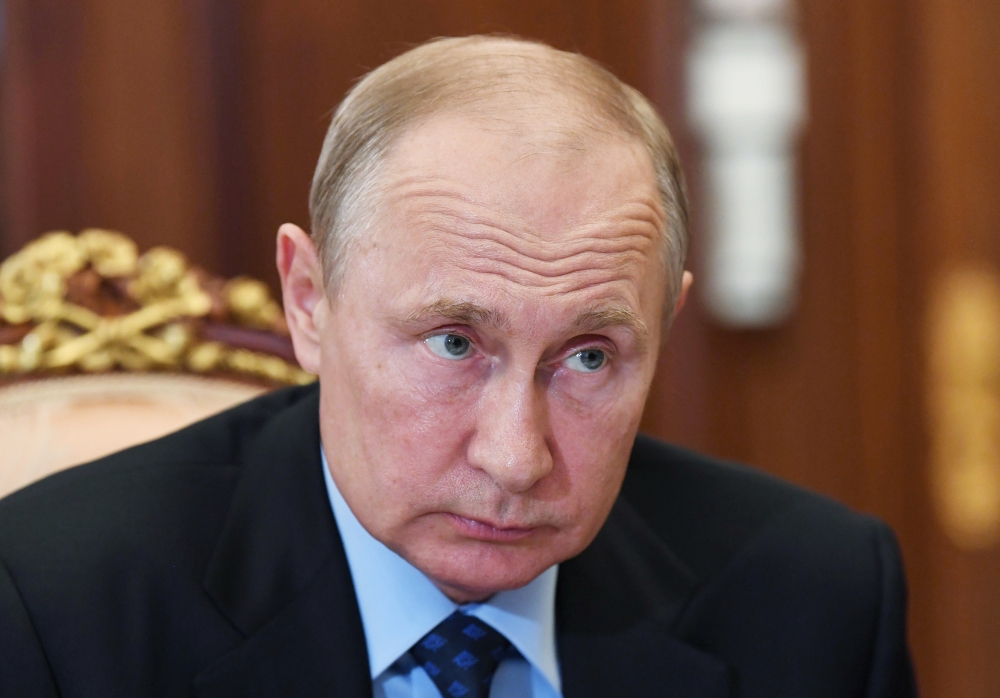 Russian President Vladimir Putin listens to General Director of the state nuclear agency Rosatom Alexei Likhachev during their meeting at the Kremlin in Moscow, Russia June 17, 2020. Sputnik/Aleksey Nikolskyi/Kremlin via REUTERS 