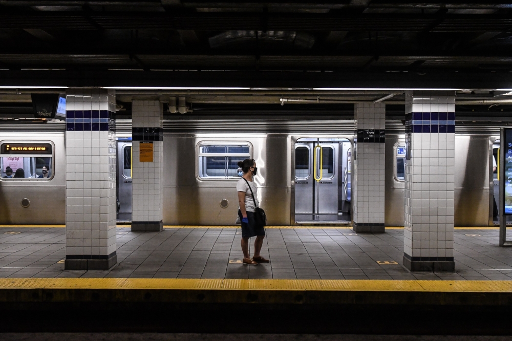 People commute on the subway in the Brooklyn borough on June 22, 2020 in New York City. Stephanie Keith/Getty Images/AFP 