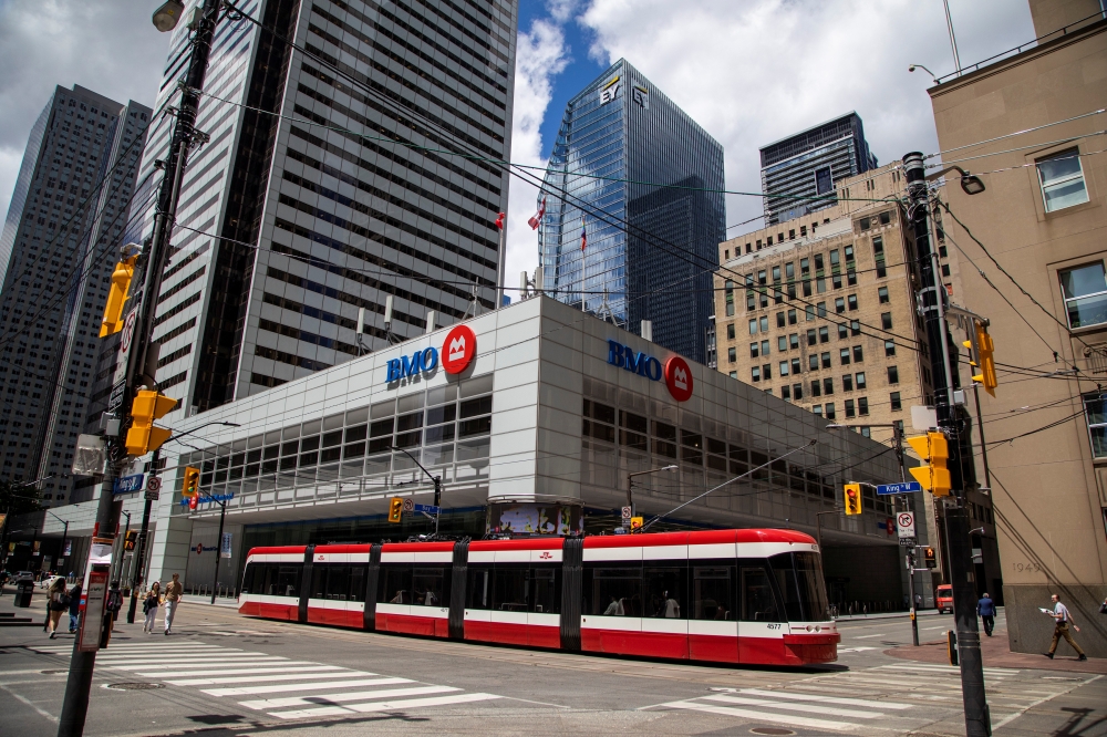 A streetcar passes in the financial district as the provincial phase 2 of reopening from the coronavirus disease (COVID-19) restrictions begins in Toronto, Ontario, Canada June 24, 2020. REUTERS/Carlos Osorio