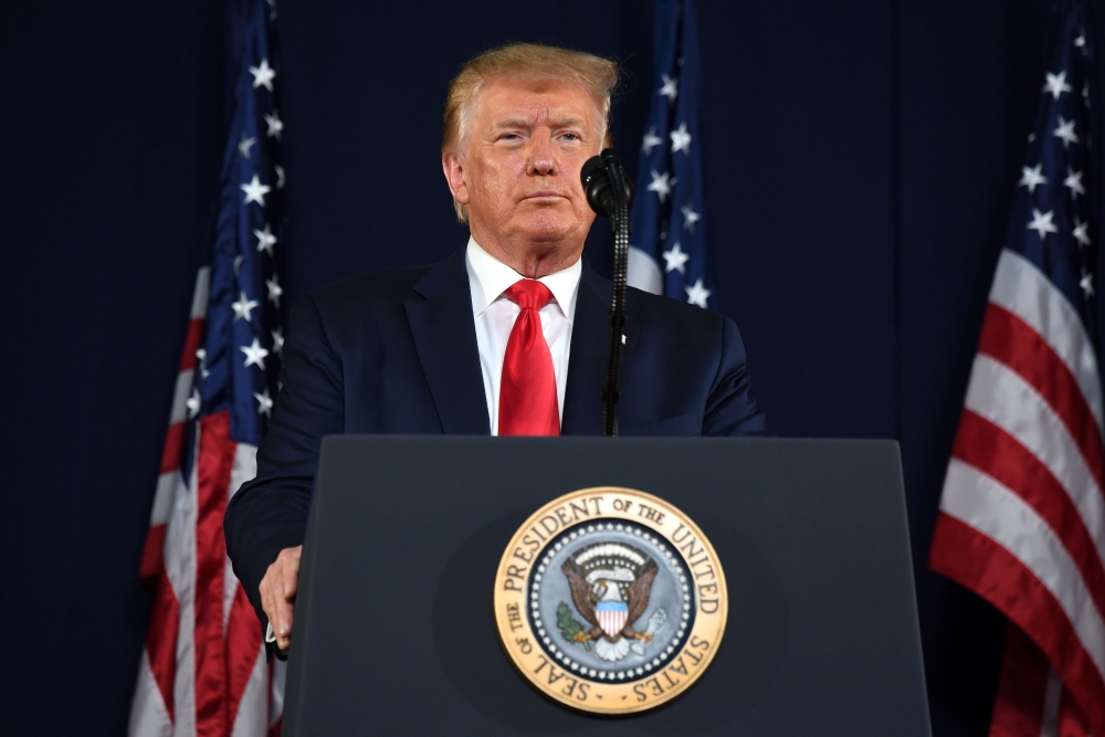 US President Donald Trump gestures as he speaks during the Independence Day events at Mount Rushmore National Memorial in Keystone, South Dakota, July 3, 2020. / AFP / SAUL LOEB