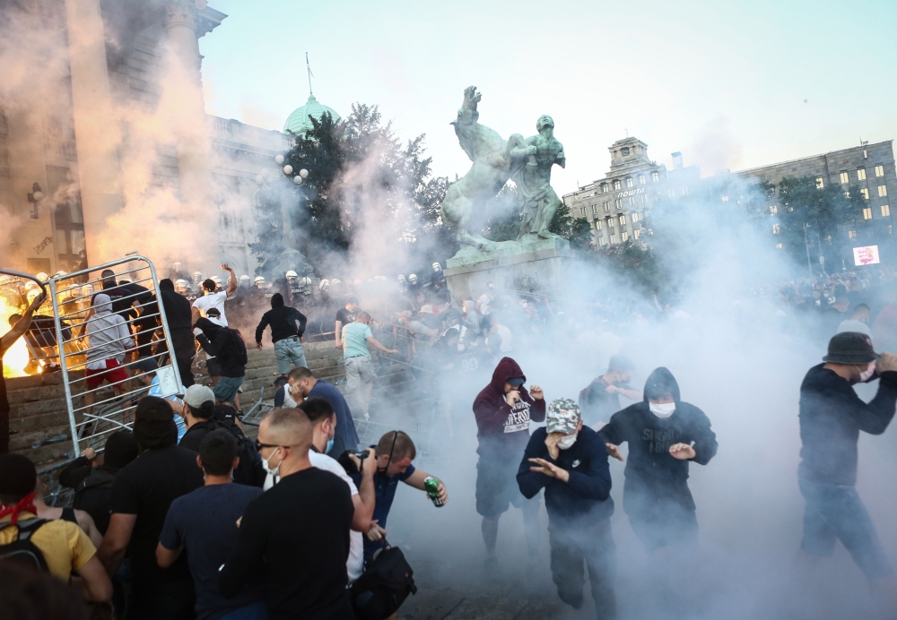 Ten police officers were injured during a second night of clashes in Belgrade with protesters angry over the government's handling of the coronavirus pandemic, a minister said Thursday.