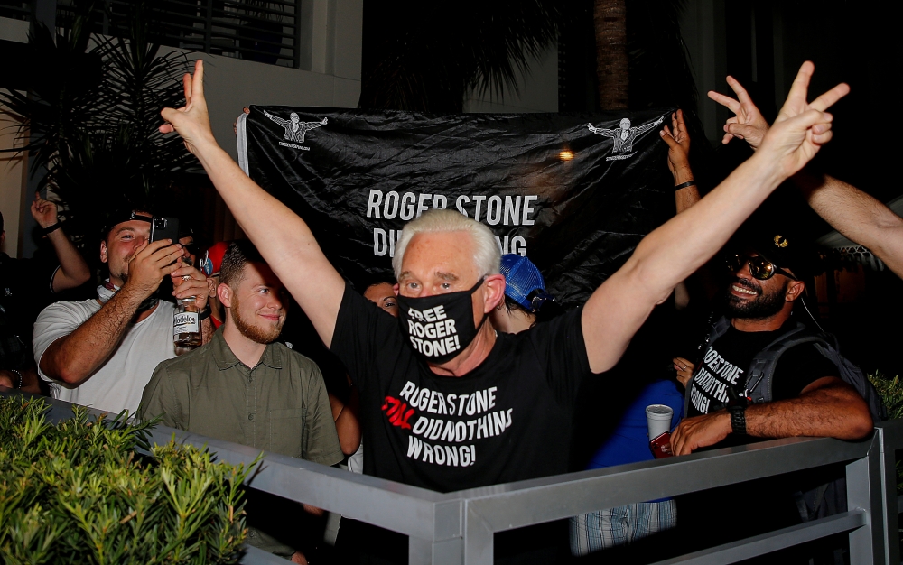 Roger Stone, a longtime friend and adviser of U.S. President Donald Trump, reacts after Trump commuted his federal prison sentence, outside his home in Fort Lauderdale, Florida, U.S. July 10, 2020. REUTERS/Joe Skipper 
