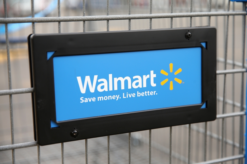 In this file photo the Walmart logo is displayed on a shopping cart at a Walmart store on August 15, 2013 in Chicago, Illinois.  / AFP / GETTY IMAGES NORTH AMERICA / SCOTT OLSON