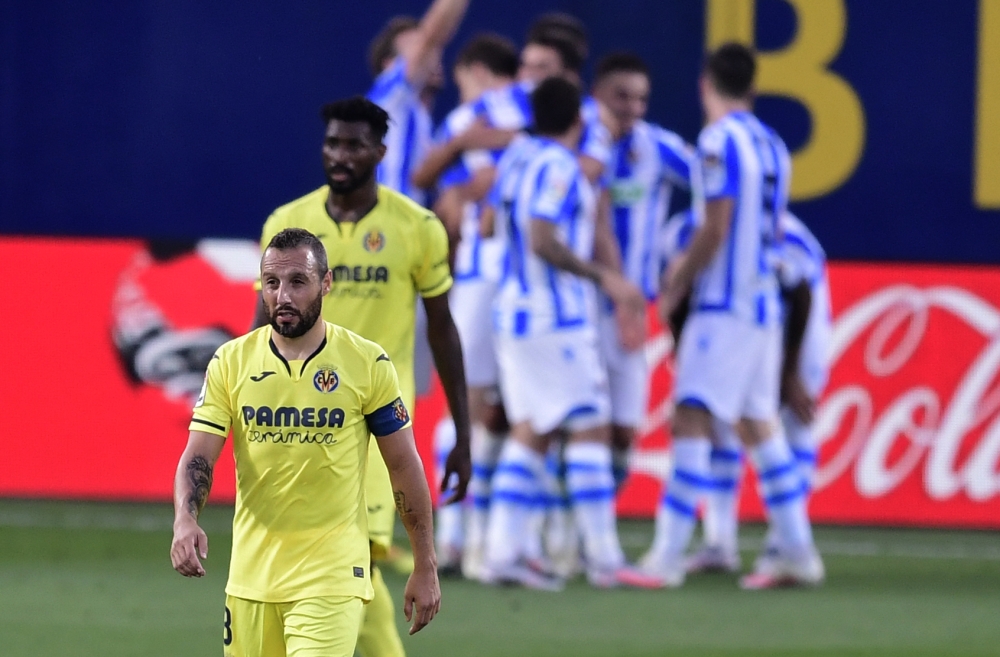 Villarreal's Spanish midfielder Santi Cazorla reacts after Real Sociedad scored during the Spanish league football match Villarreal CF against Real Sociedad at La Ceramica stadium in Vila-real on July 13, 2020. / AFP / JOSE JORDAN