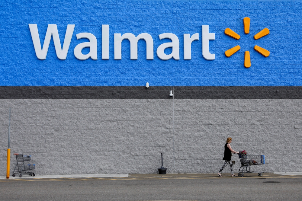 A shopper is seen without a mask after leaving a Walmart store in Bradford, Pennsylvania, U.S. July 20, 2020. REUTERS/Brendan McDermid