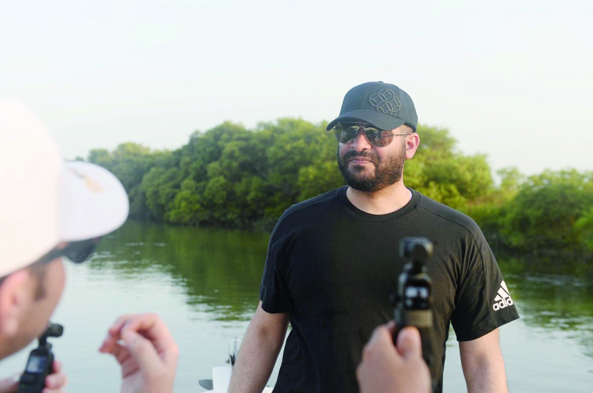 Assistant Director of the Natural Reserves Department, Salem Al Safran, while visiting a mangrove to mark the International Day for the Conservation of the Mangrove Ecosystem.