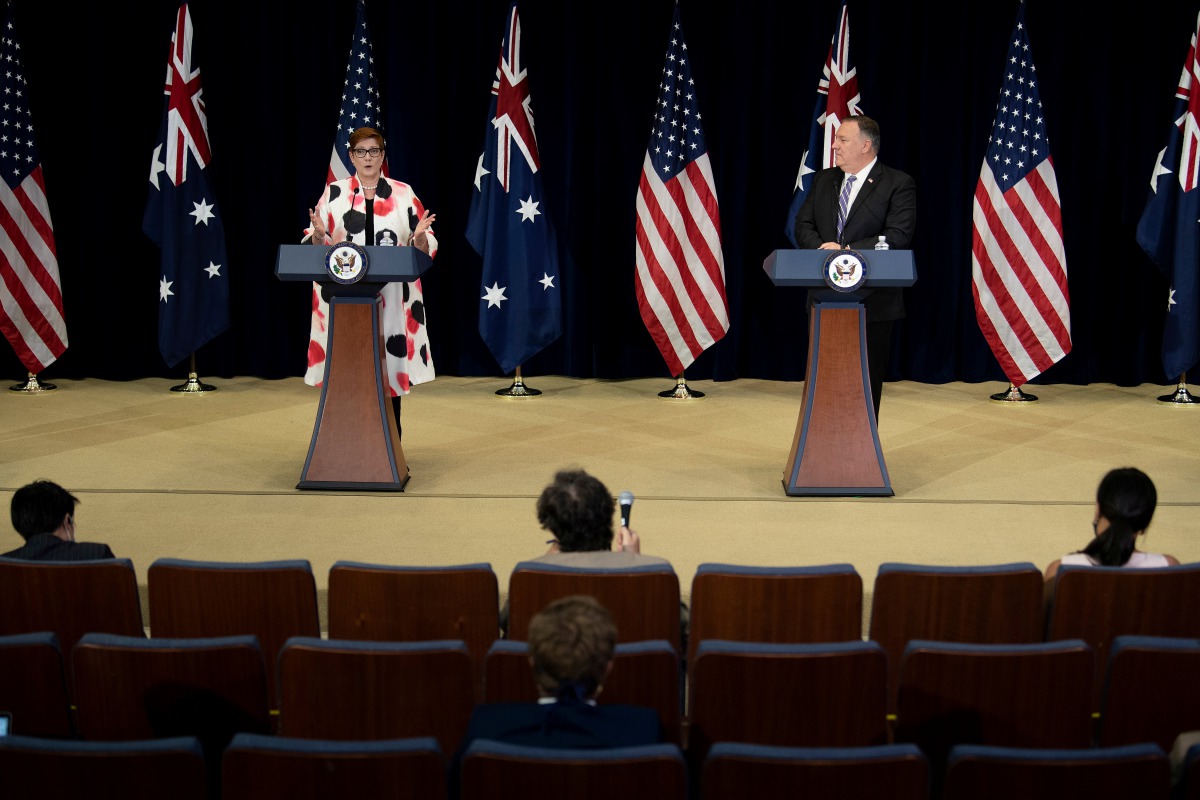 U.S. Secretary of State Mike Pompeo listens while Australia's Foreign Minister Marise Payne speaks during a press conference at the U.S. Department of State following the 30th AUSMIN in Washington, D.C. July 28, 2020. Brendan Smialowski/Pool via REUTER