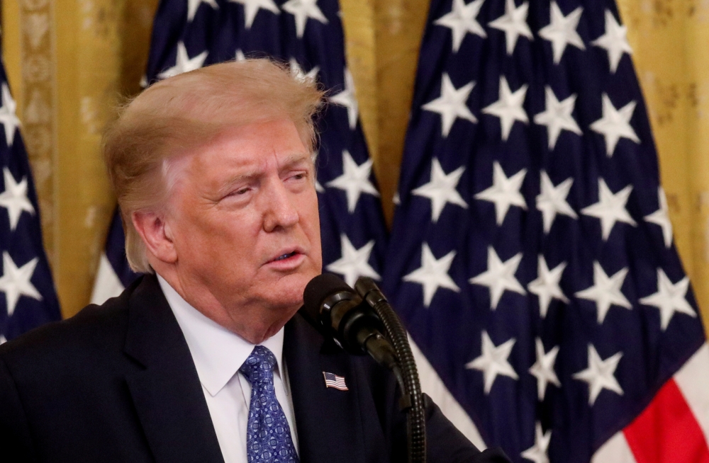 FILE PHOTO: US President Donald Trump speaks about sending federal law enforcement agents to several U.S. cities to assist local police in combating what the Justice Department has described as a 