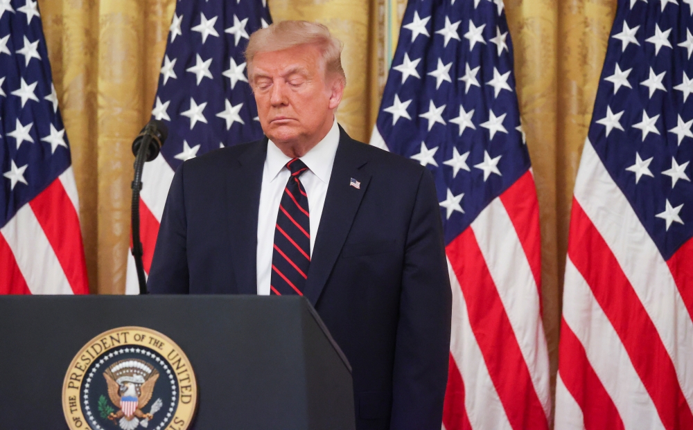 U.S. President Donald Trump participates in a signing ceremony for HR 1957 , the Great American Outdoors Act, in the East Room of the White House in Washington, U.S., August 4, 2020. REUTERS/Jonathan Ernst