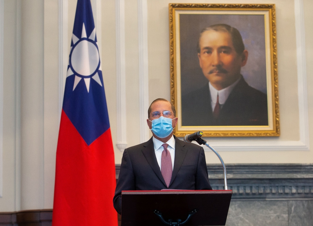 U.S. Secretary of Health and Human Services Alex Azar wearing a face mask speaks during a meeting with Taiwan President Tsai Ing-wen (not pictured) at the presidential office, in Taipei, Taiwan August 10, 2020. Central News Agency/Pool via REUTERS