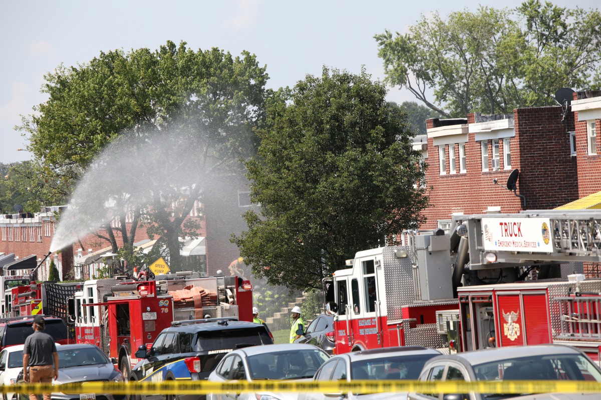 Fire trucks are seen at the scene of an explosion in a residential area of Baltimore, Maryland, U.S. August 10, 2020. REUTERS/Rosem Morton