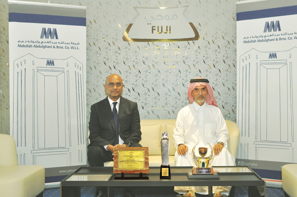 Dr Nasser Abdulghani Al Abdulghani (right), Chairman of Abdullah Abdulghani & Bros Co (AAB), and R K Murugan, Acting CEO of AAB with the most prestigious awards the company has received.