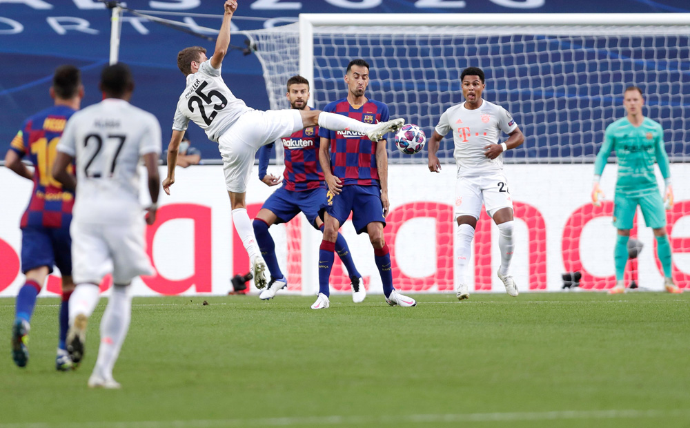 Bayern Munich’s German forward Thomas Mueller scoring against Barcelona during the UEFA Champions League quarter-final match played at the Luz Stadium in Lisbon, yesterday.