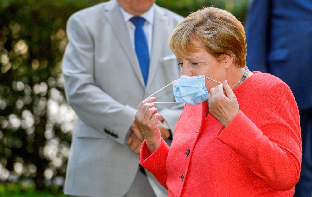 Angela Merkel warns pandemic threat leaves no room to ease restrictions