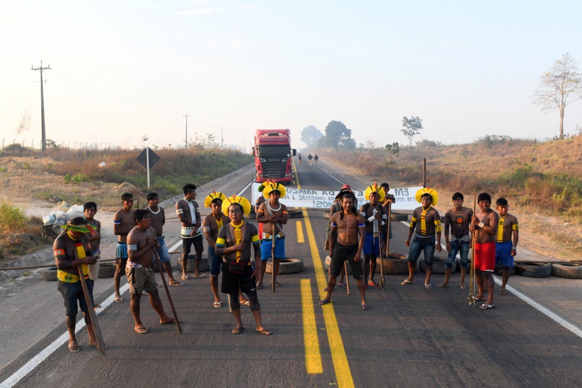 Kayapo indigenous people block Brazil's BR 163 national highway, as they protest against the government measures in the indigenous lands to avoid the spread of the coronavirus disease (COVID-19), in Novo Progresso, Para state, Brazil August 17, 2020. REUT